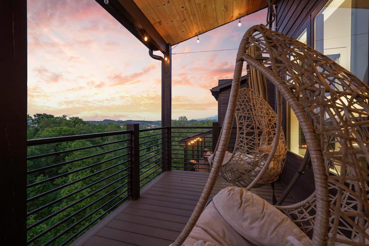 Hanging chair on a balcony at sunset with warm light