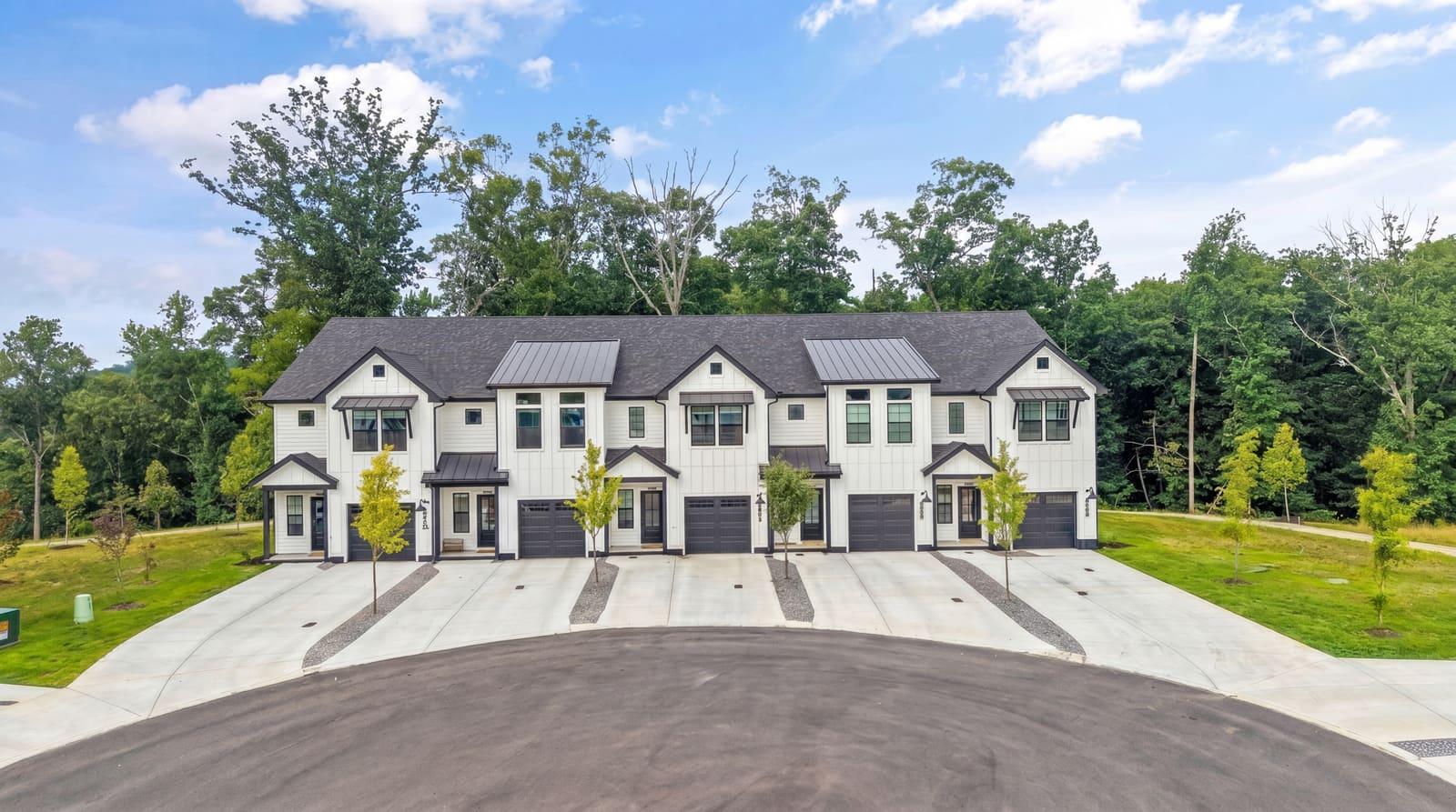 Aerial photograph of townhome buildings and guest parking
