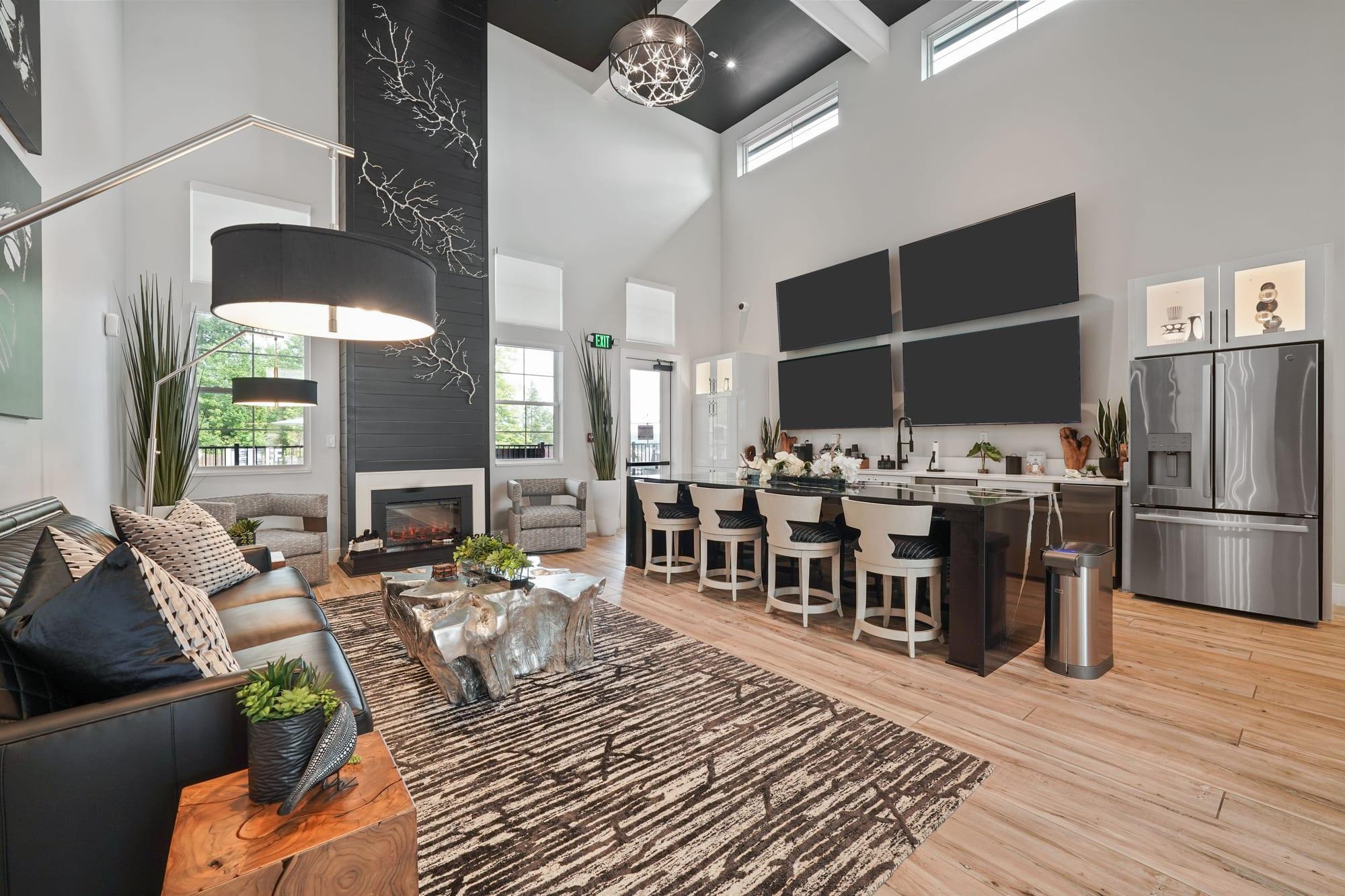 Clubhouse great room with lounge seating and entertainment kitchen