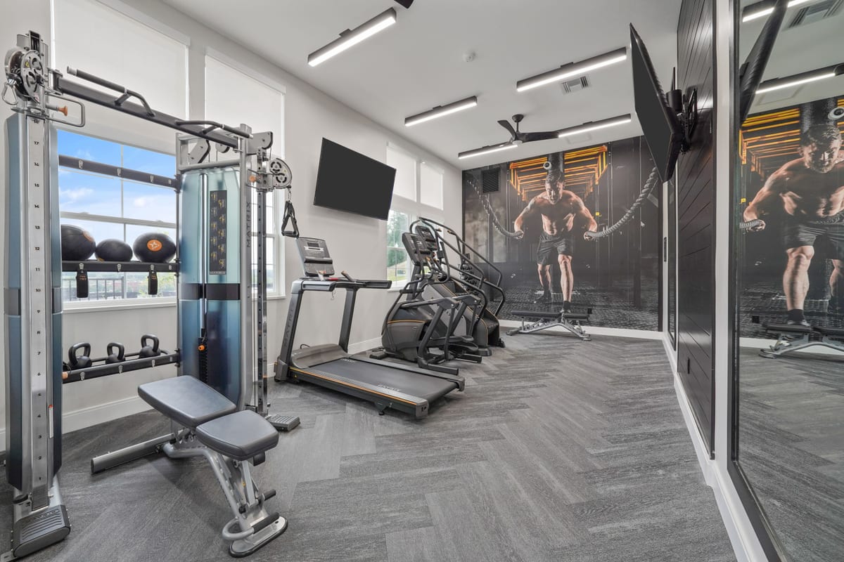 Community fitness room with mural wall and equipment